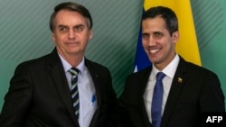 Jair Bolsonaro, presidente de Brasil, y Juan Guaidó, presidente interino de Venezuela.