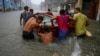 Una calle inundada por las intensas lluvias en La Habana. (AP/Ramon Espinosa)