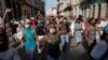 Manifestantes gritan consignas antigubernamentales durante la protesta del 11 de julio en La Habana. (REUTERS/Alexandre Meneghini).