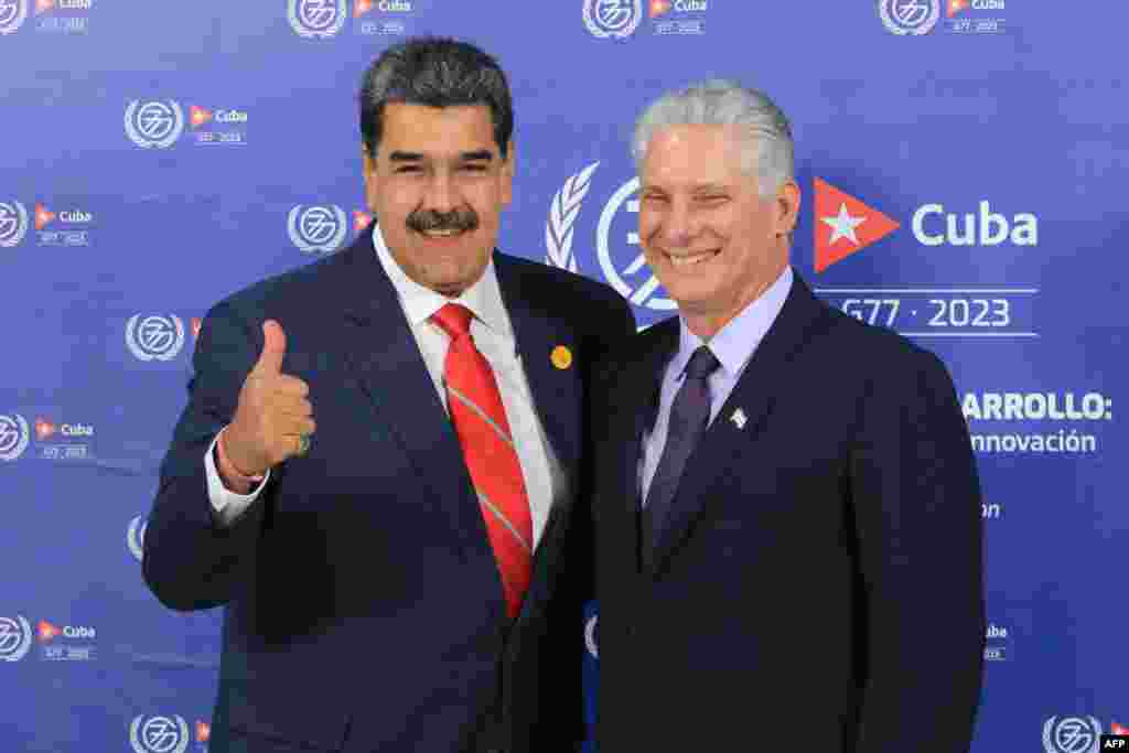 Nicolás Maduro (i), siendo recibido por Miguel Díaz Canel, a su llegada al Centro de Convenciones de La Habana el 15 de septiembre de 2023. AFP PHOTO / VENEZUELAN PRESIDENCY /ZURIMAR CAMPOS