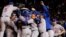 Los Mets celebran su victoria sobre los Cachorros de Chicago. Van a la Serie Mundial.