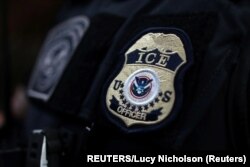 Emblema del Servicio de Control de Inmigración y Aduanas de EEUU