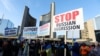Ukrainian supporters rally after Russia launched a massive military operation against Ukraine, in Toronto