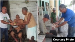Opositores Félix Navarro (izq) y Francisco Rangel (der), del Proyecto Tondique, entregan almuerzo a desamparados.