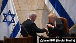 El presidente de Estados Unidos Donald Trump y el primer ministro israelí Benjamin Netanyahu en la Knéset, en Jerusalén.