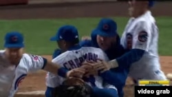 Los Cachorros celebran el triunfo.